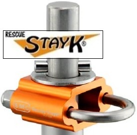 Rescue StayK® device featuring a sturdy, orange clamp attachment with a metal ring, designed for safety in rescue operations.