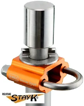 Rescue StayK attachment featuring a metal eyelet and orange base. Designed for safety rigging in rescue operations and climbing.