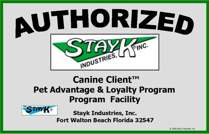 Authorized facility sign for StayK Industries, Inc. in Fort Walton Beach, highlighting their Canine Client™ Pet Advantage & Loyalty Program.
